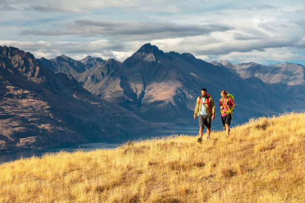 Couple Walking In Mountains