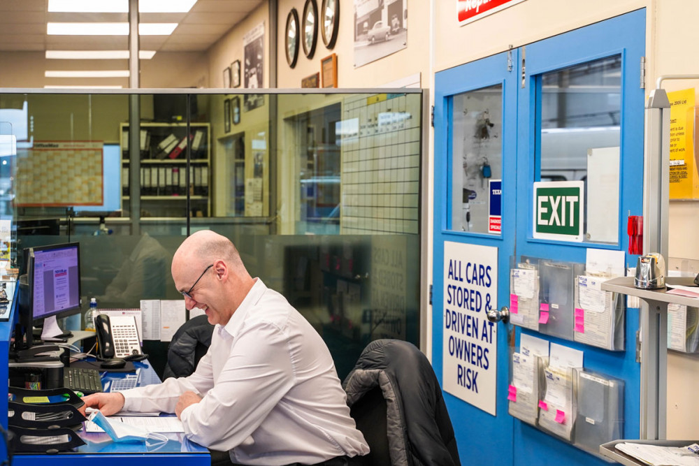 Man Smiling In Office