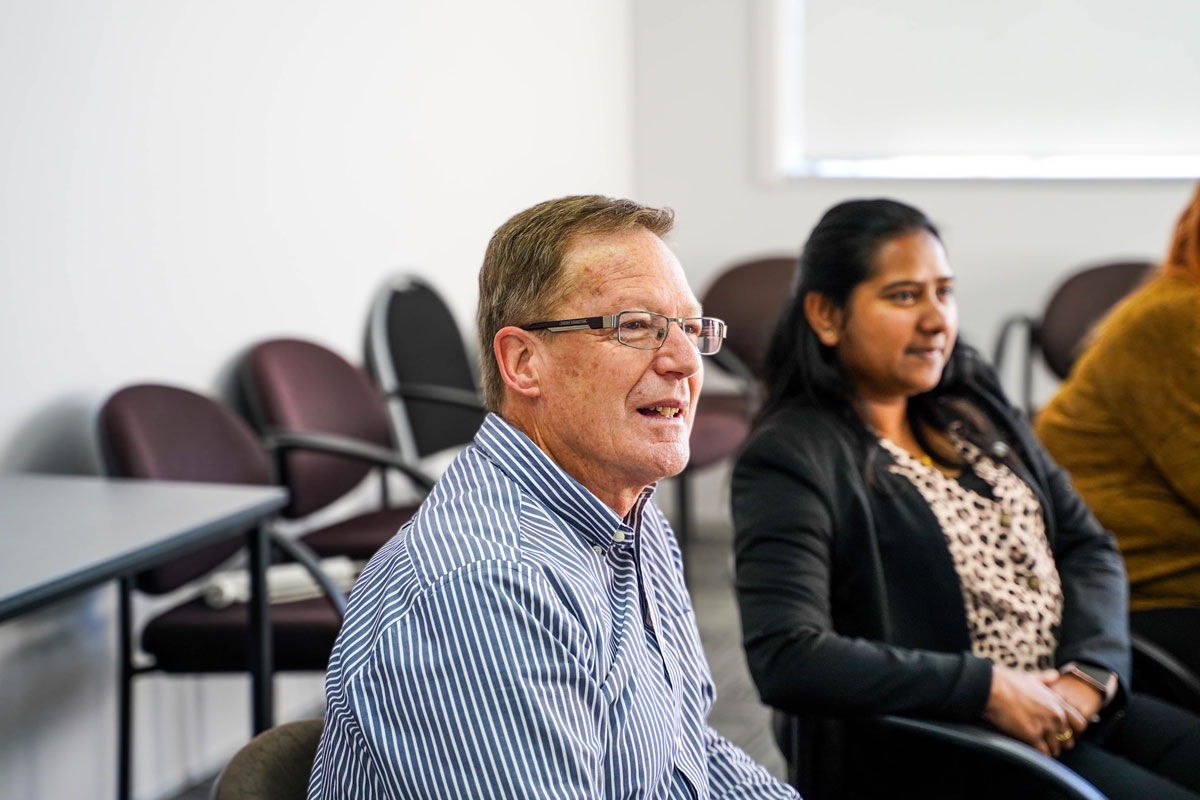 Man Listening In Workshop